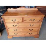 PINE CHEST OF 2 SHORT OVER 3 LONG DRAWERS ON BRACKET SUPPORTS.