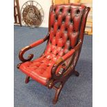 MAHOGANY X - FRAMED SCROLL ARM BUTTONED BACK RED LEATHER ARMCHAIR