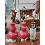 PAIR OF RED PORCELAIN TABLE LAMPS AND ONE OTHER GLASS TABLE LAMP