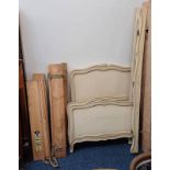 PAIR OF PAINTED CONTINENTAL SINGLE BED FRAMES.