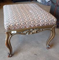 19TH CENTURY GILT STOOL WITH DECORATIVE TAPESTRY TOP ON CABRIOLE SUPPORTS.