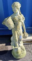 RECONSTITUTED STONE FIGURE OF LADY WITH BASKET.