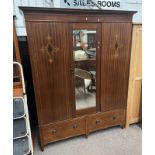 EARLY 20TH CENTURY INLAID MAHOGANY MIRROR DOOR WARDROBE WITH 2 DRAWERS TO BASE ON TURNED SUPPORTS.