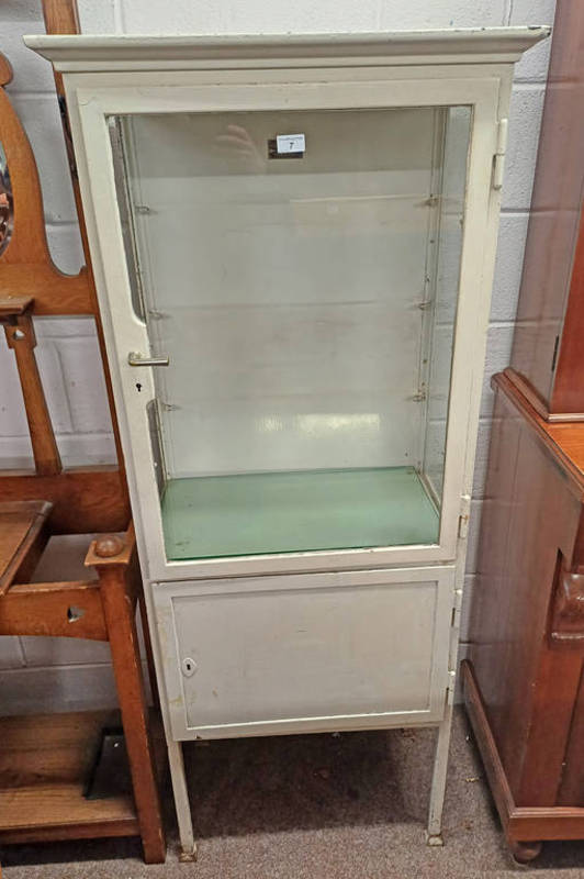 EARLY 20TH CENTURY PAINTED METAL MEDICINE CABINET WITH GLAZED PANEL DOOR OPENING TO SHELVED