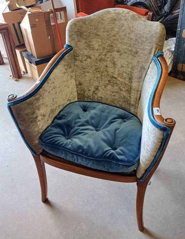 EARLY 20TH CENTURY BEECHWOOD FRAMED TUB CHAIR WITH BERGERE PANEL SEAT & SIDES.