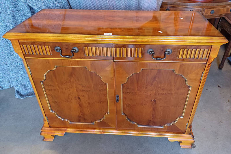 YEW WOOD SIDE CABINET WITH 2 DRAWERS OVER 2 PANEL DOORS LABELLED CHARLES BARR REPRODUCTION