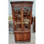 20TH CENTURY MAHOGANY CORNER CABINET WITH 2 ASTRAGAL GLAZED DOORS OVER 2 PANEL DOORS - 189 CM TALL