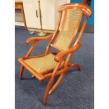 EARLY 20TH CENTURY MAHOGANY FRAMED FOLDING STEAMER ARMCHAIR WITH BERGERE PANEL BACK & SEAT