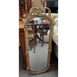 DECORATIVE CARVED GILT FRAMED MIRROR.