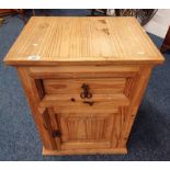 PINE BEDSIDE CABINET WITH DRAWER OVER SINGLE PANEL DOOR