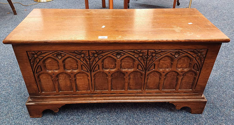 OAK COFFER WITH LIFT-UP LID & CARVED PANEL FRONT ON BRACKET SUPPORTS