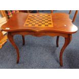 MAHOGANY CHESS TABLE WITH SHAPED TOP & SINGLE DRAWER ON SHAPED SUPPORTS.