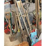 SELECTION OF GARDEN TOOLS TO INCLUDE HOE, SPADE, RAKE, LAWNMOWER ETC.