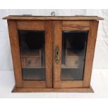 OAK SMOKER CABINET WITH 2 GLAZED PANEL DOORS OPENING TO FITTED INTERIOR,