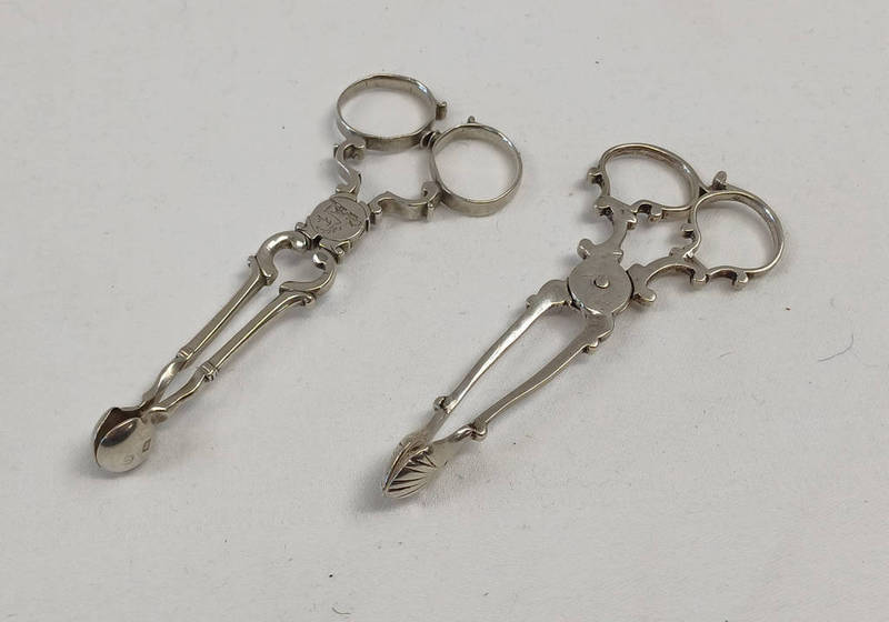 2 PAIRS OF 18TH CENTURY SILVER SUGAR NIPS 1 FAINTLY MARKED & 1 UNMARKED