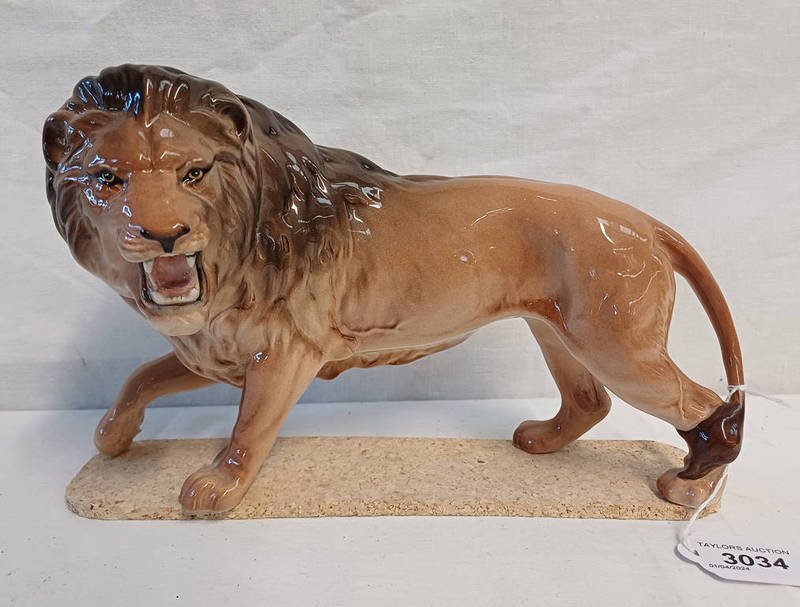 BESWICK FIGURE OF A LION,