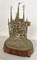19TH CENTURY STRIKING SKELETON CLOCK MODELLED ON LICHFIELD CATHEDRAL SURMOUNTED BY 3 SPIRES OVER