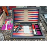 K & C LONDON BACKGAMMON SET TOGETHER WITH BEGINNING BACKGAMMON BY TIM HOLLAND Condition