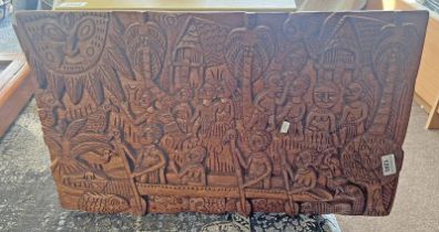 CARVED WOODEN TRIBAL SCENE OF FIGURES ON A CANOE,