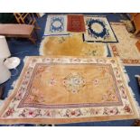 5 FLORAL DECORATED RUGS,