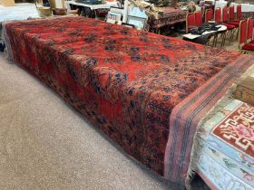 RED GROUND MIDDLE EASTERN CARPET,