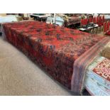 RED GROUND MIDDLE EASTERN CARPET,