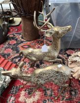 PAIR OF BRASS FIGURES DEPICTING A STAG & A DOE,