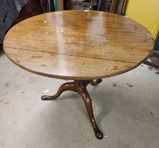 19TH CENTURY MAHOGANY FLIP TOP CIRCULAR PEDESTAL TABLE ON 3 SPREADING SUPPORTS.