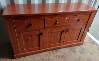 OAK SIDEBOARD WITH 3 DRAWERS OVER 3 PANEL DOORS.