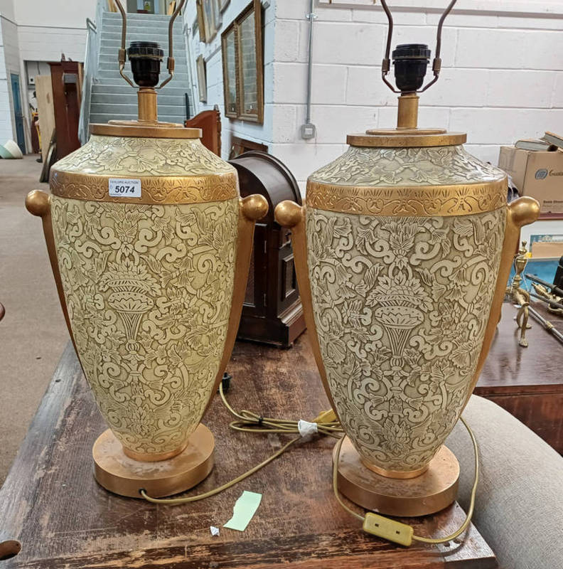 PAIR OF CREAM & GILT DECORATIVE TABLE LAMPS ON CIRCULAR BASES Condition Report: Both