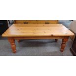 PINE RECTANGULAR COFFEE TABLE ON TURNED SUPPORTS,