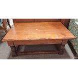 OAK RECTANGULAR COFFEE TABLE WITH SLIDING TOP OPENING TO STORAGE SPACE ON TURNED SUPPORTS,
