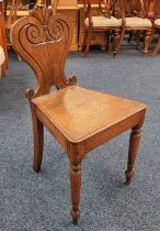 19TH CENTURY OAK HALL CHAIR WITH DECORATIVE CARVED BACK ON TURNED SUPPORTS Condition