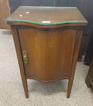INLAID MAHOGANY SINGLE DOOR BEDSIDE CABINET WITH SHAPED FRONT ON SQUARE TAPERED SUPPORTS