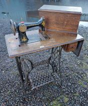 OAK SINGER SEWING TABLE WITH SEWING MACHINE & SINGLE DRAWER ON CAST IRON TREADLE,