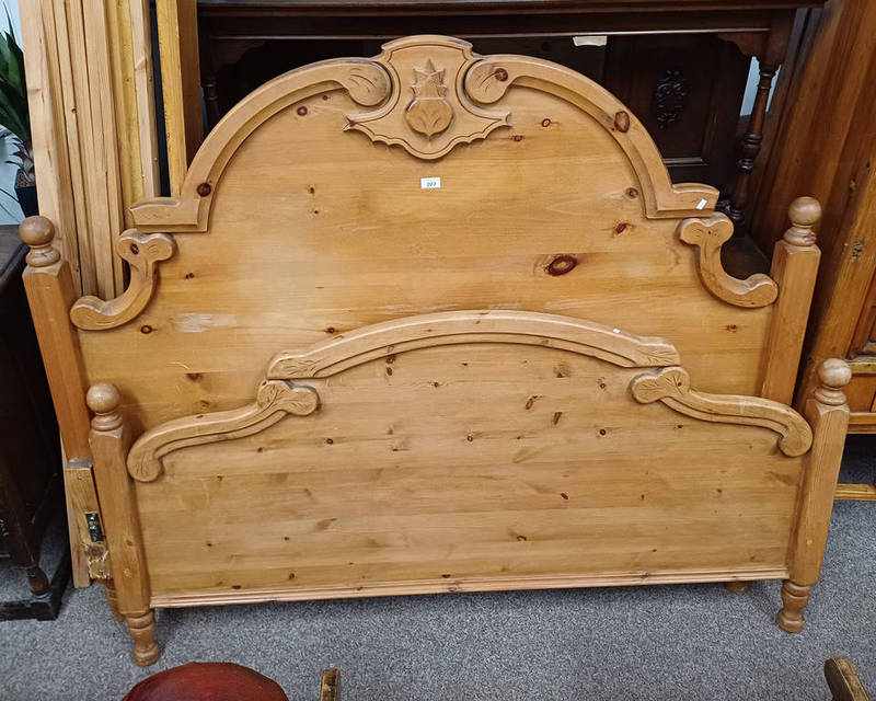 PINE BEDFRAME, THE HEADBOARD SURMOUNTED BY CARVED THISTLE DECORATION. WITH LATER ALTERATIONS.