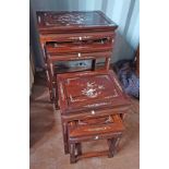 NEST OF 4 ORIENTAL HARDWOOD TABLES WITH DECORATIVE ORIENTAL MOTHER OF PEARL INLAY