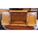 20TH CENTURY OAK TABLE TOP STATIONARY CABINET OPENING TO FITTED INTERIOR WITH SCROLL CALENDAR,