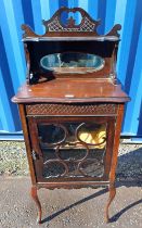 MAHGOANY MIRROR BACK CABINET WITH CARVED DECORATION & SINGLE GLAZED PANEL DOOR ON SHAPED SUPPORTS