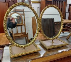 PAIR OF GILT FRAMED OVAL DRESSING TABLE MIRRORS