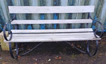 WOODEN GARDEN BENCH WITH PAINTED SHAPED CAST METAL ENDS
