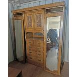 19TH CENTURY WARDROBE WITH CARVED DECORATION & 2 CENTRALLY SET PANEL DOORS OVER 2 SHORT OVER 2 LONG