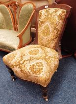 LATE 19TH CENTURY MAHOGANY FRAMED LADIES CHAIR WITH CARVED DECORATION ON TURNED SUPPORTS