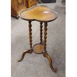 WALNUT PLANT STAND WITH TREFOIL TOP & BARLEY TWIST DECORATION ON 3 SPREADING SUPPORTS,