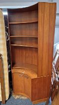 TEAK CONCAVE CORNER BOOKCASE WITH ADJUSTABLE OPEN SHELVES OVER 2 PANEL DOORS,