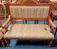 LATE 19TH CENTURY MAHOGANY FRAMED SETTEE ON TURNED SUPPORTS