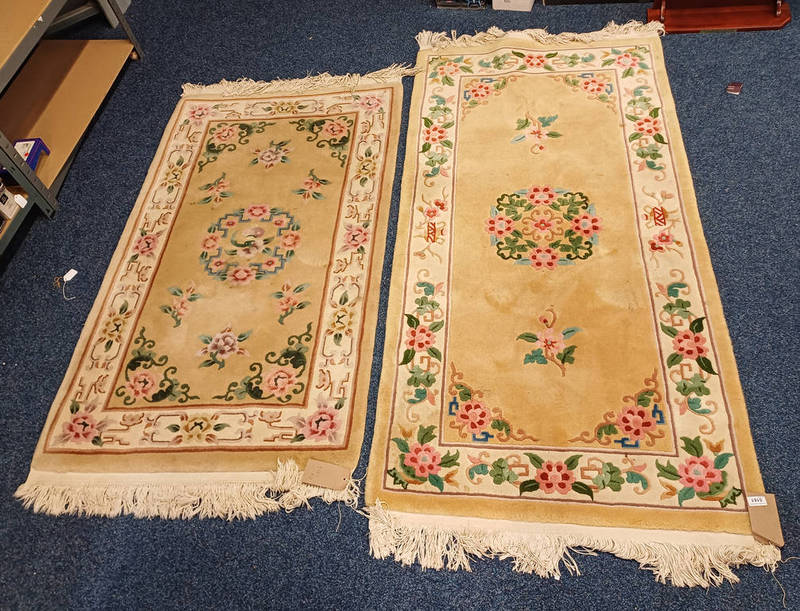 EASTERN STYLE CARPET WITH CREAM FLORAL PATTERN & ONE OTHER SIMILAR CARPET.