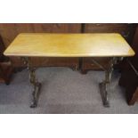 19TH CENTURY MAHOGANY RECTANGULAR TABLE ON LATER DECORATIVE CAST METAL SUPPORTS.