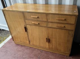 MID 20TH CENTURY OAK SIDEBOARD WITH 2 SHORT & 1 LONG DRAWER OVER 2 PANEL DOORS WITH LARGE PANEL