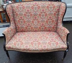 19TH CENTURY MAHOGANY FRAMED WINGBACK SETTEE ON REEDED SUPPORTS